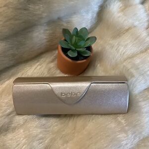Bebe champagne eyeglass case with magnetic close